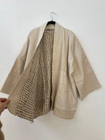 white coat inside dots