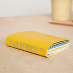 small hand-sewn notebook