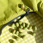 olive bag charm