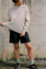 relaxed rolled seam sweater