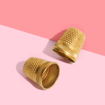 gold thimble