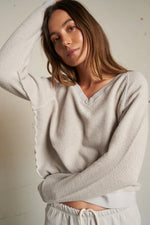 zuri reverse fleece v-neck raglan sweatshirt