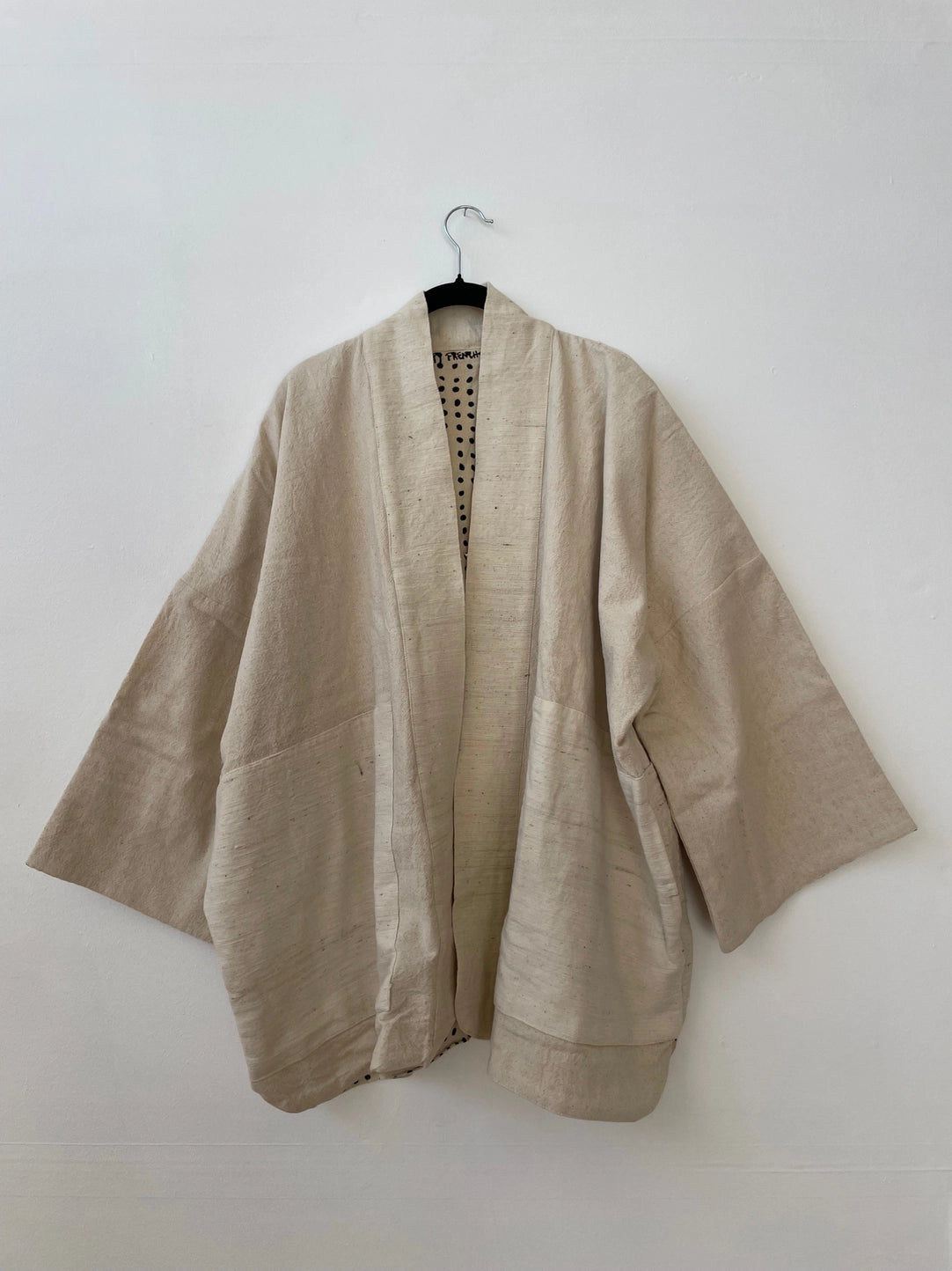 white coat inside dots