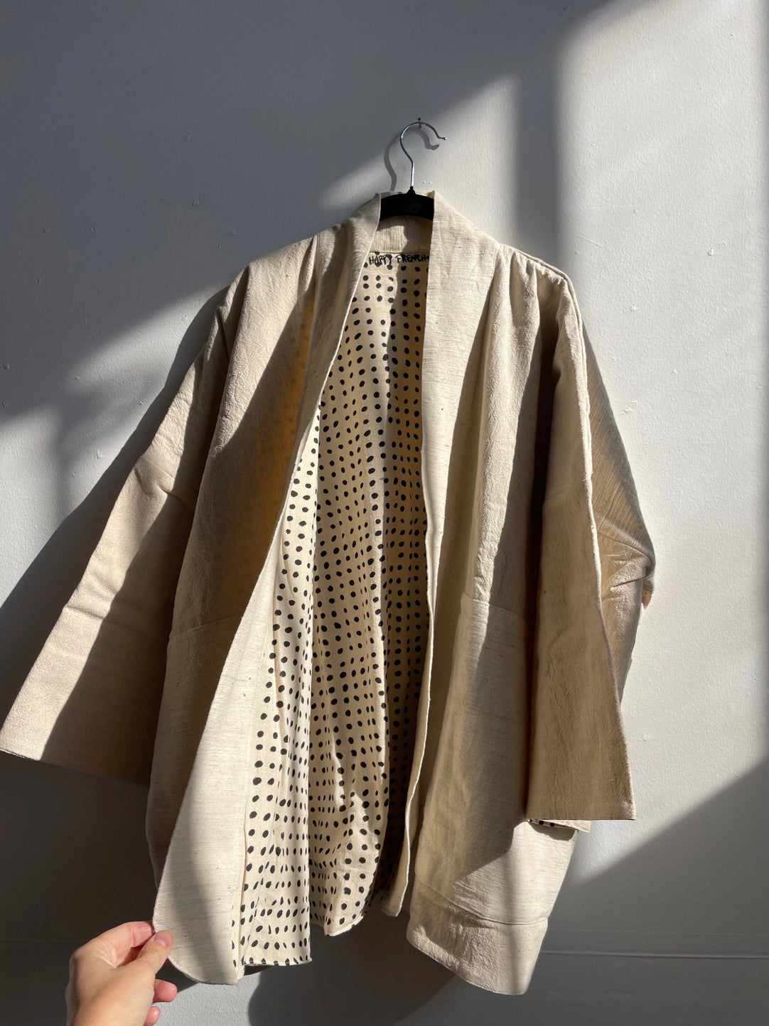 white coat inside dots