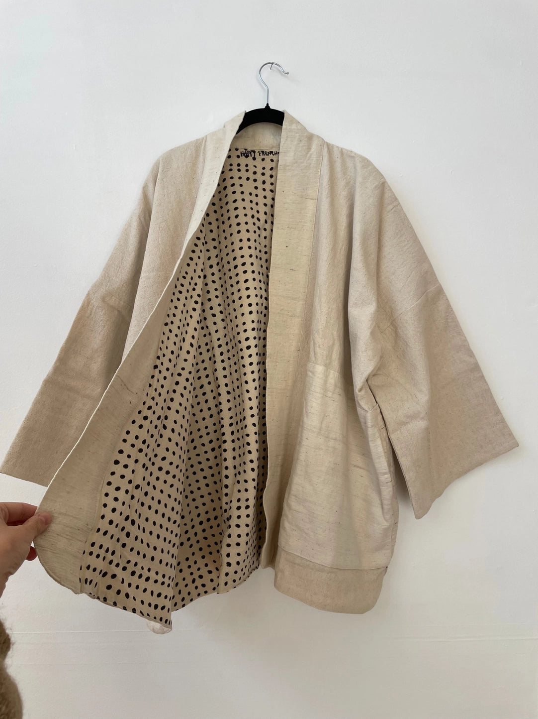 white coat inside dots