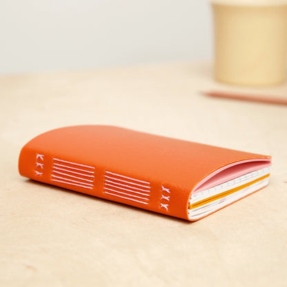 small hand-sewn notebook