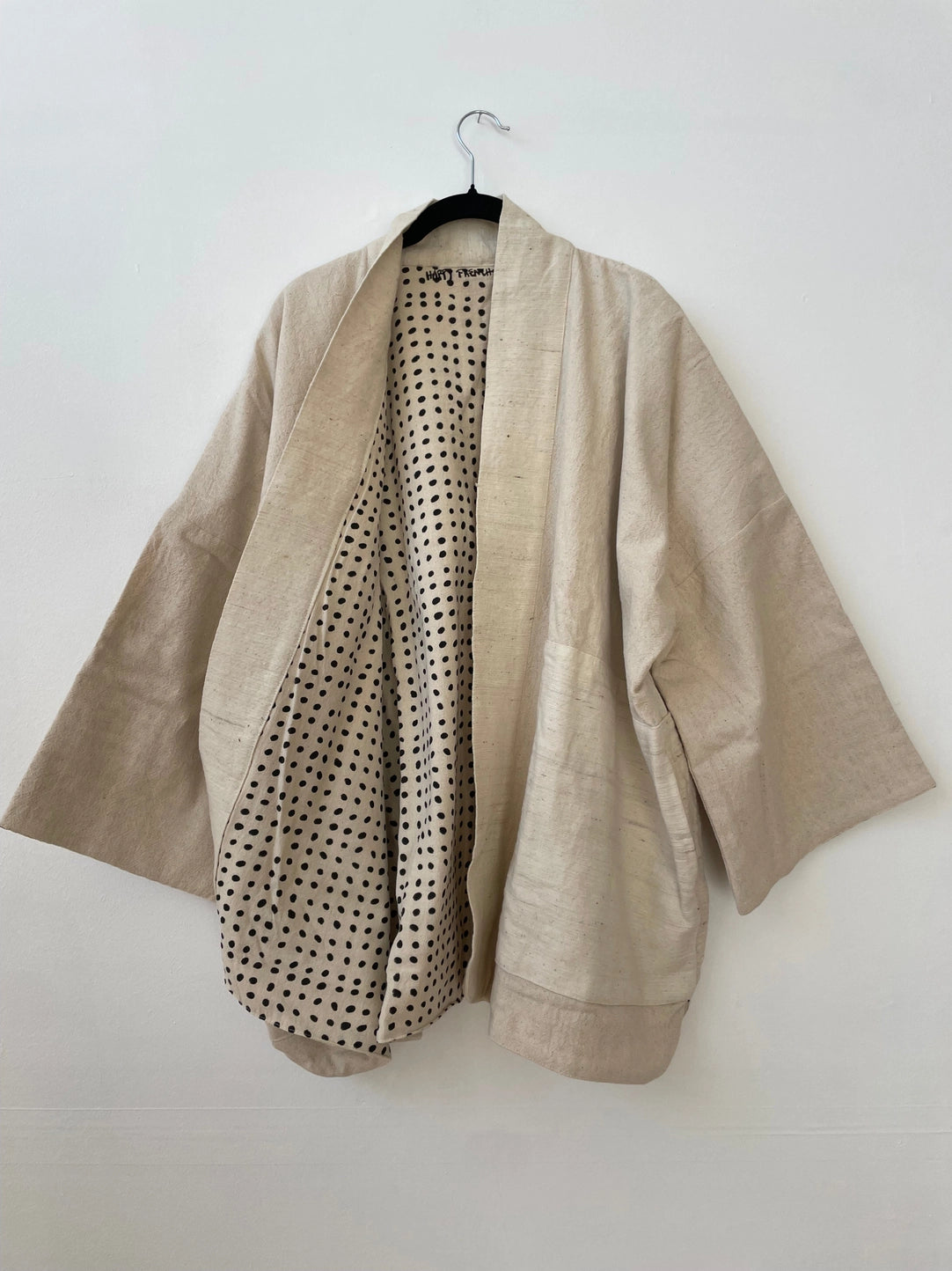 white coat inside dots