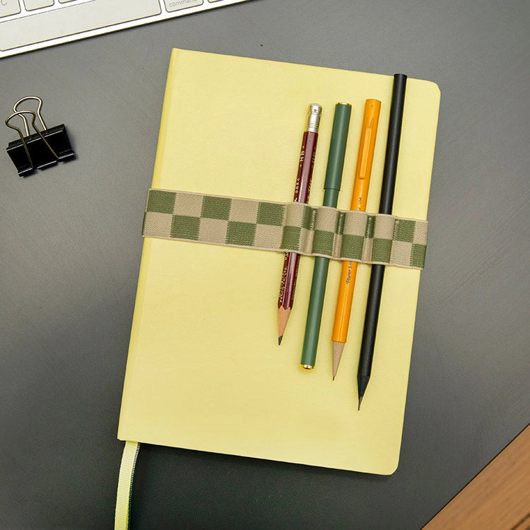 green pen holder book band