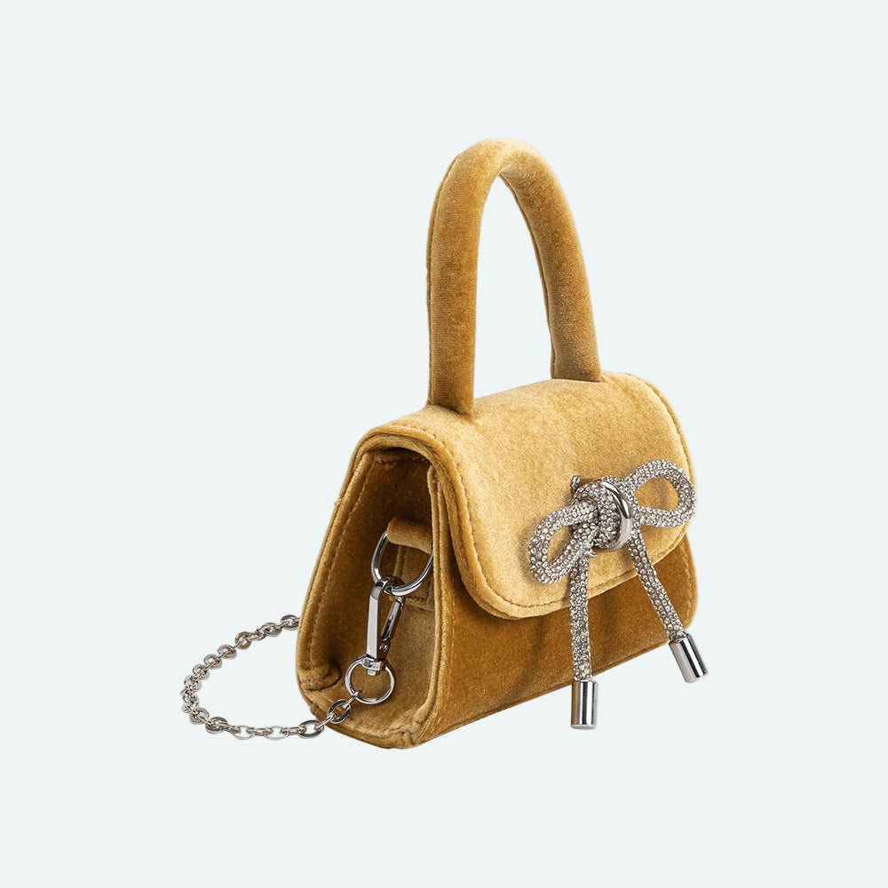 sabrina gold mini velvet top handle bag