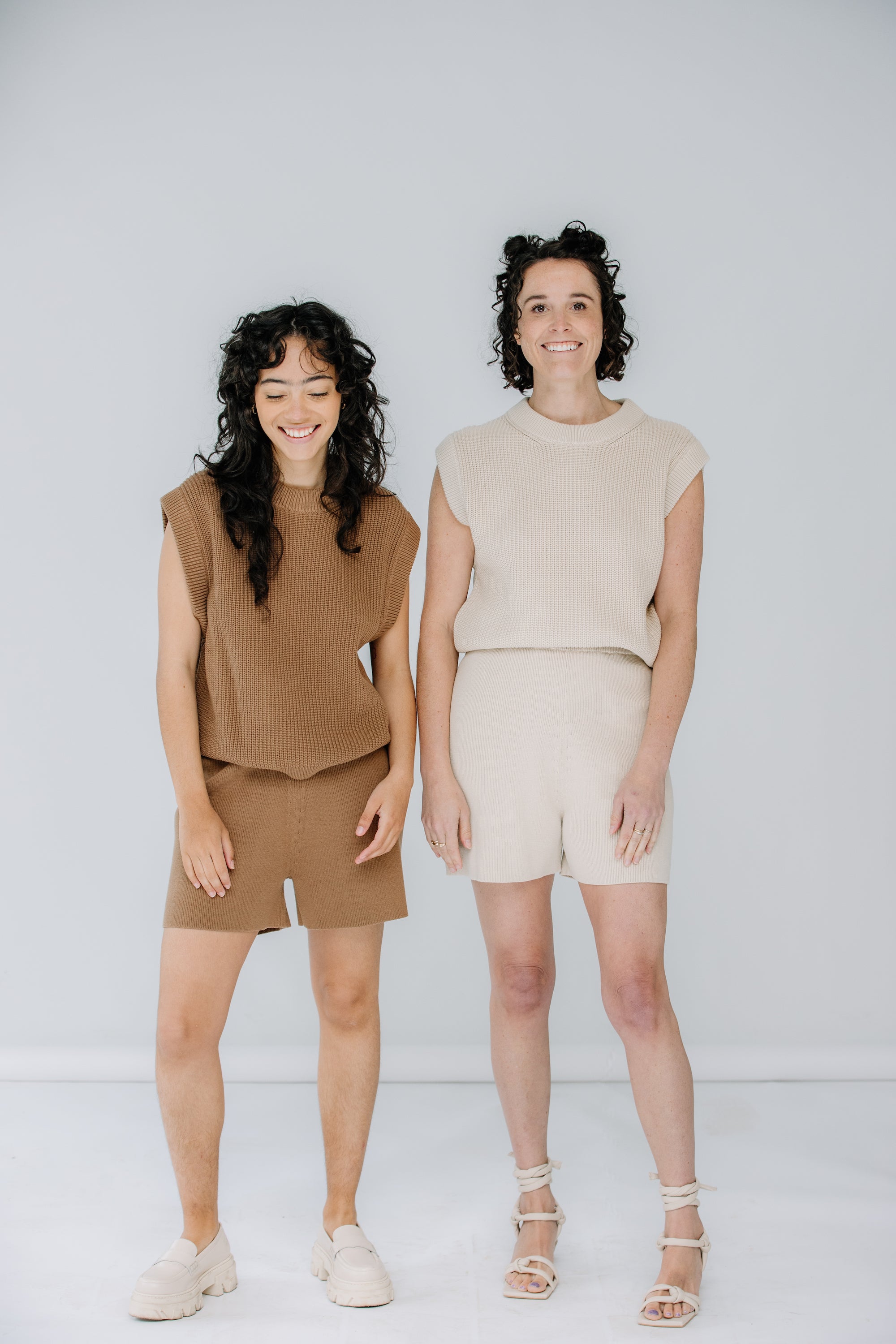 lacey and gabby wear the sleeveless knit top and matching shorts from mr mittens ss23.