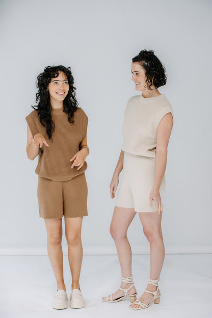 lacey and gabby wear the sleeveless knit top and matching shorts from mr mittens ss23.