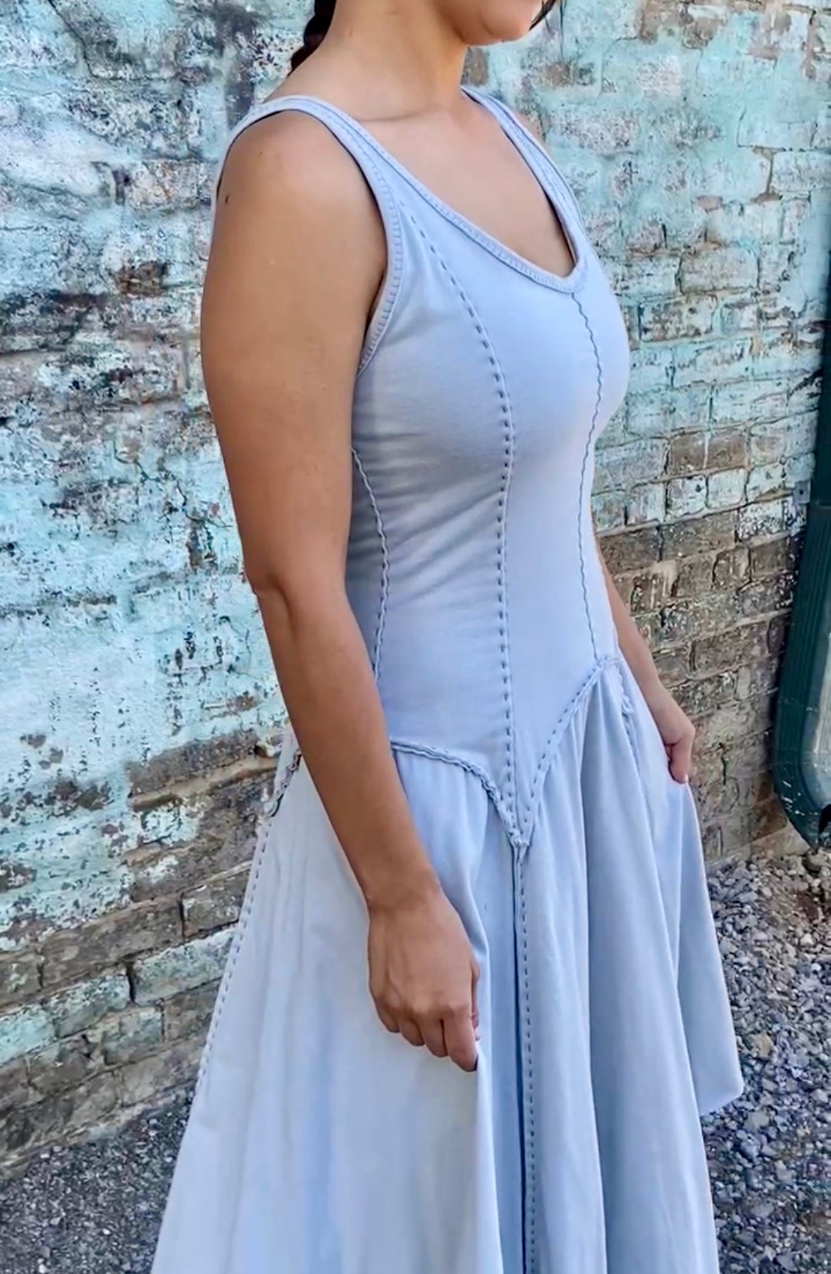 detail of the alabama chanin hand sewn cynthia tank dress with a dropped waist in sky blue organic cotton