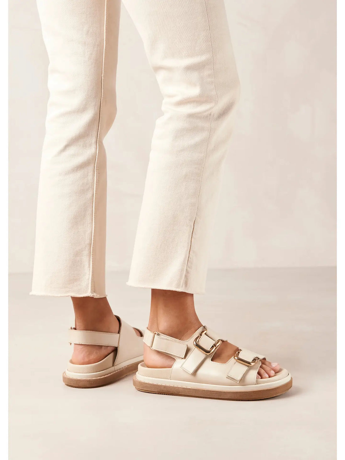 ALOHAS handcrafted, unisex harper sandals in cream leather with gold buckle details