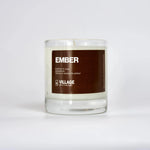 the ember candle by village apothecary has notes of leather & rose, laudanum, tobacco leaves, and amber