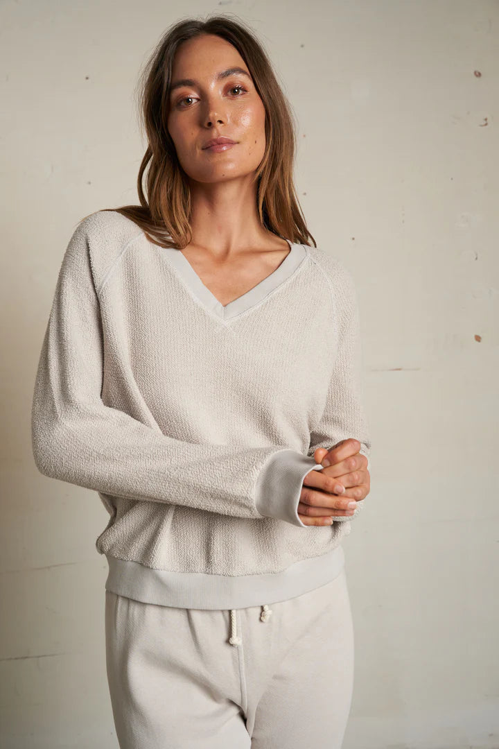 zuri reverse fleece v-neck raglan sweatshirt