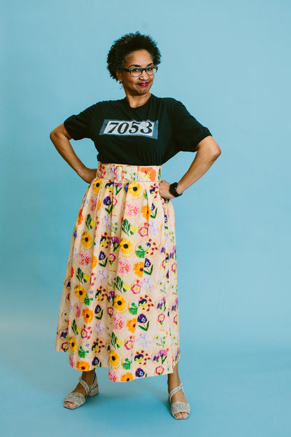 valerie stands with her hands on her hips wearing a black and white alabama chanin x basic. 7053 tee with the rachel antonoff vinita skirt in shortbread cookie fabric | slow fashion + ethical clothing brands at basic.