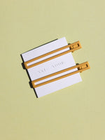 nat + noor leia clip in mustard at basic.