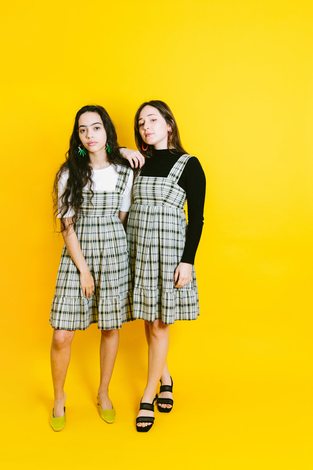 gabby and wreed wear the dahlia dress by plante in black plaid | ethically-made dresses at basic. 