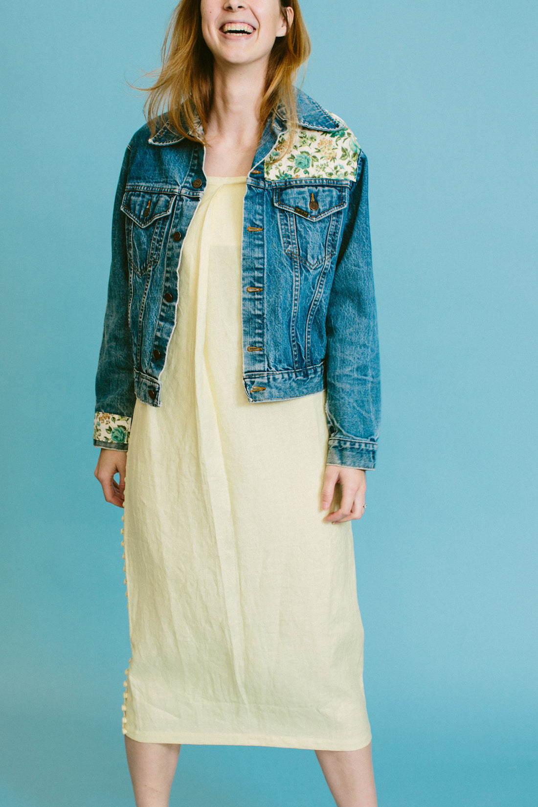 maggie wears the ajaie alaie full moon dress with a one-of-a-kind upcycled quilted denim jacket  | a basic shop